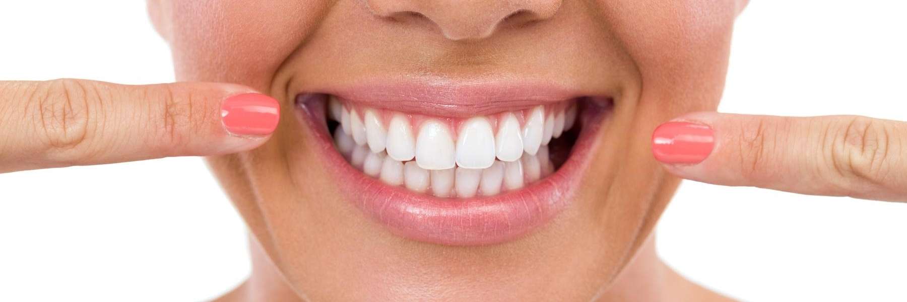 woman pointing her teeth