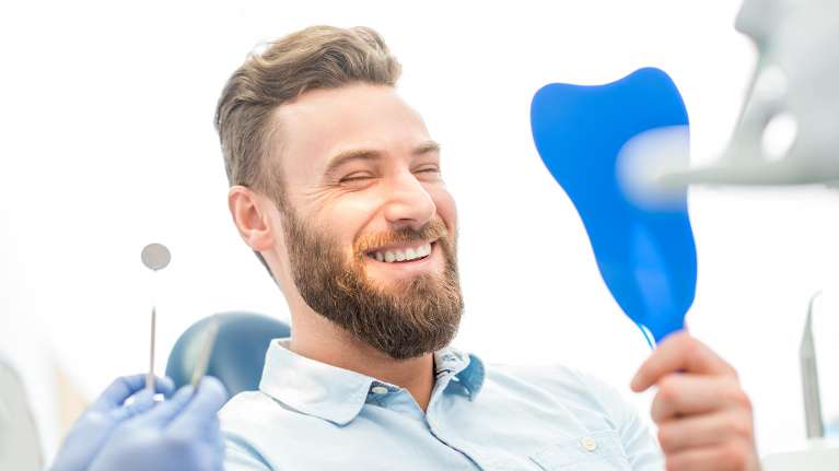 A man enjoying his dental work | dental implants prairieville