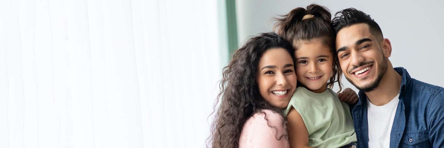 A smiling family at home | family dentist 70806