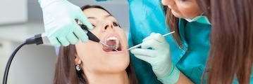 A woman getting a dental cleaning