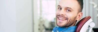 A man smiling in the dentist's office | Dentist Baton Rouge