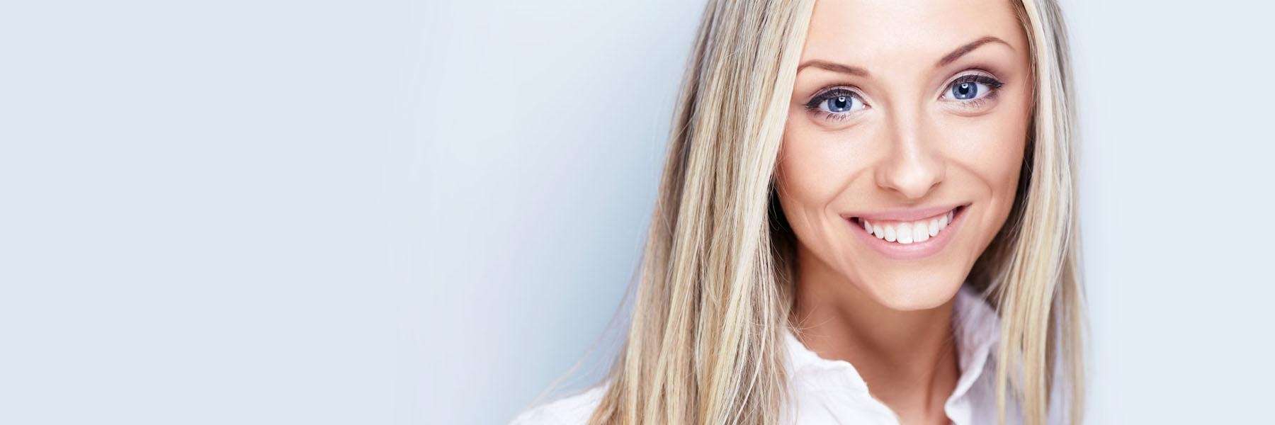 A woman smiling | Dental crowns in Baton Rouge